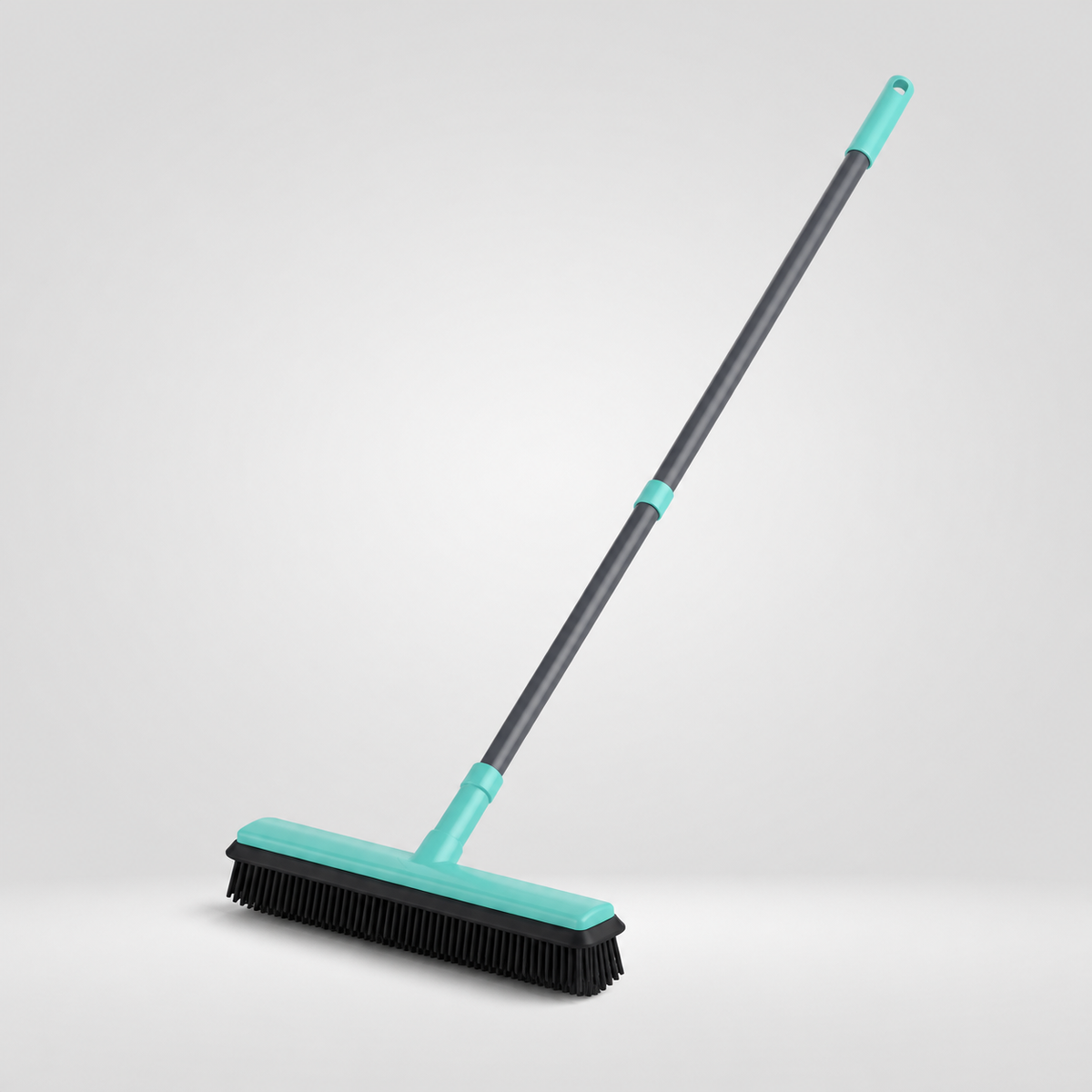 Vista completa del escobillón de goma turquesa y gris