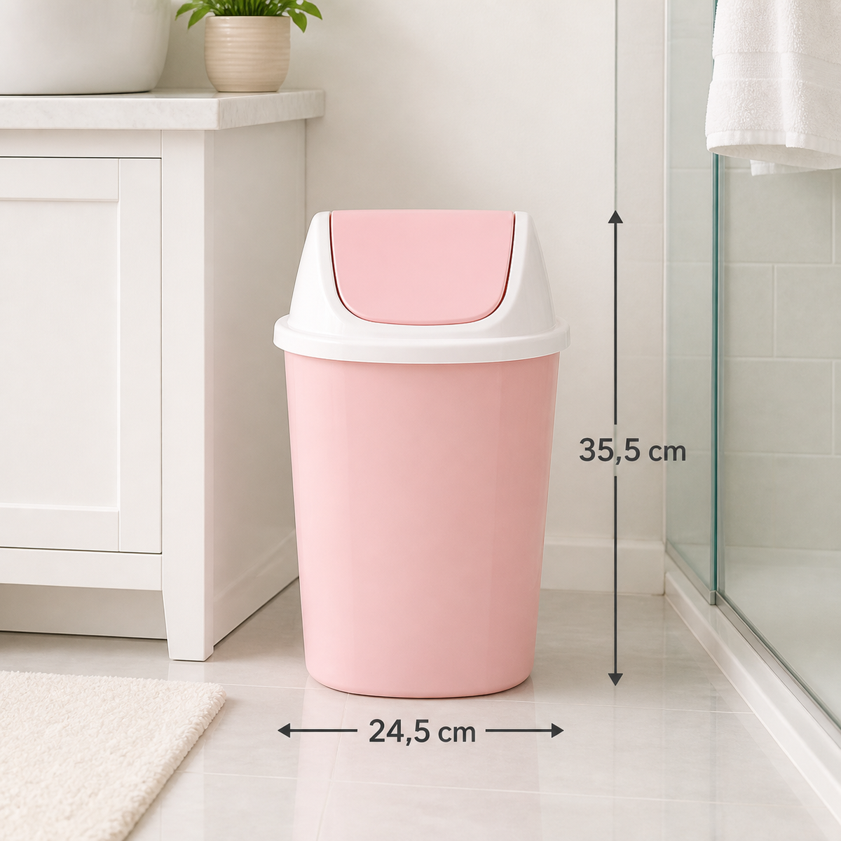 Basurero rosado con tapa vaivén de 24,5 x 35,5 cm en baño