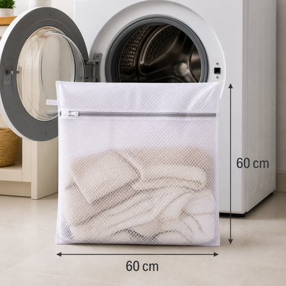 Bolsa de lavado de malla de 60 x 60 cm junto a la lavadora