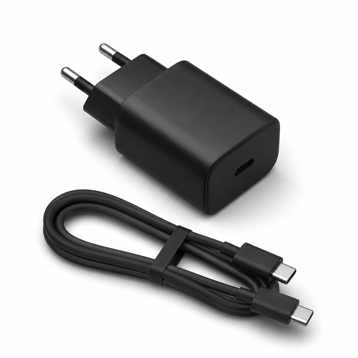 Cargador rápido negro de 30 W con cable USB-C sobre fondo blanco