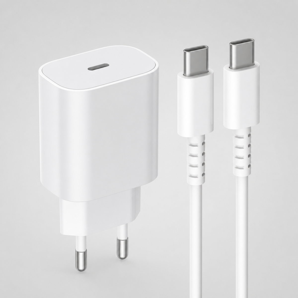 Cargador USB-C blanco y cable en vista de estudio