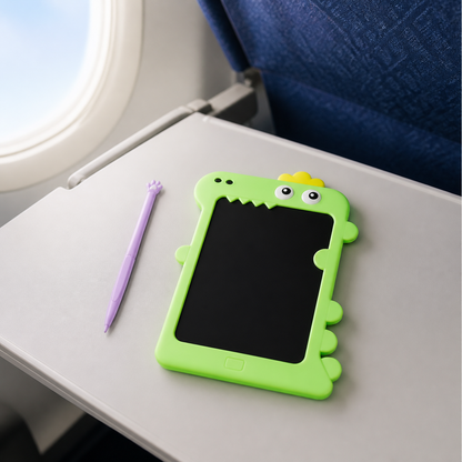 Pizarra LCD dinosaurio portátil sobre bandeja de avión